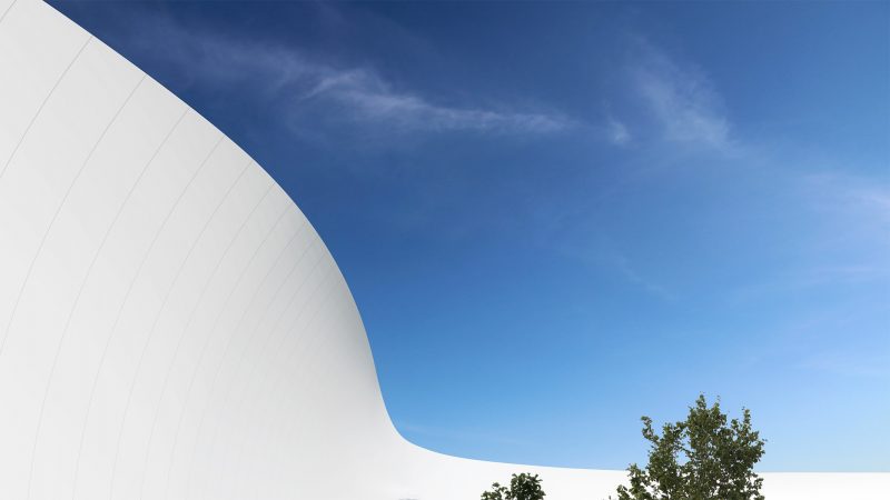 Perspective de la courbe de la coque du bâtiment, comme une vague blanche sur fond de ciel bleu