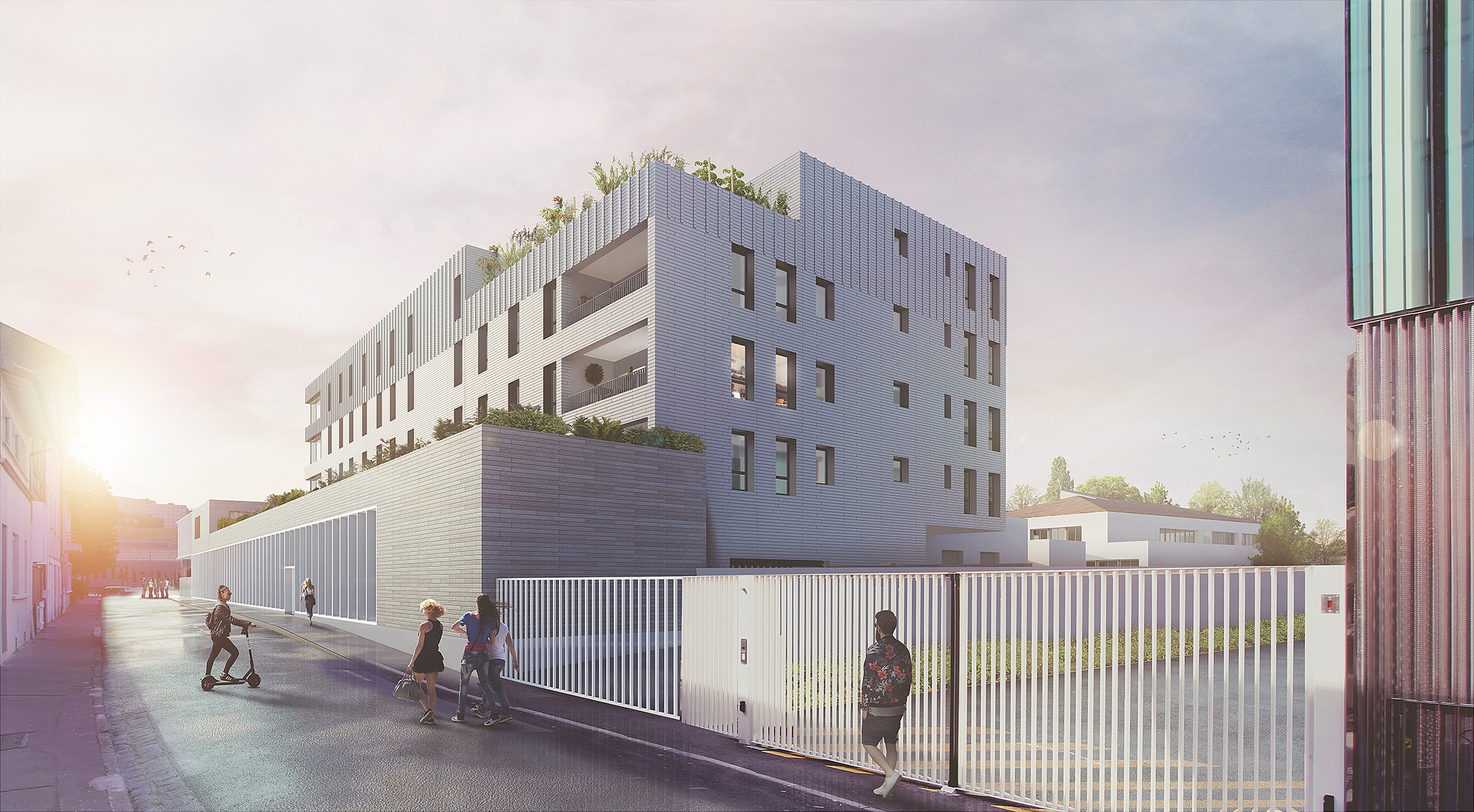Perpective du bâtiment au couché du soleil depuis la rue