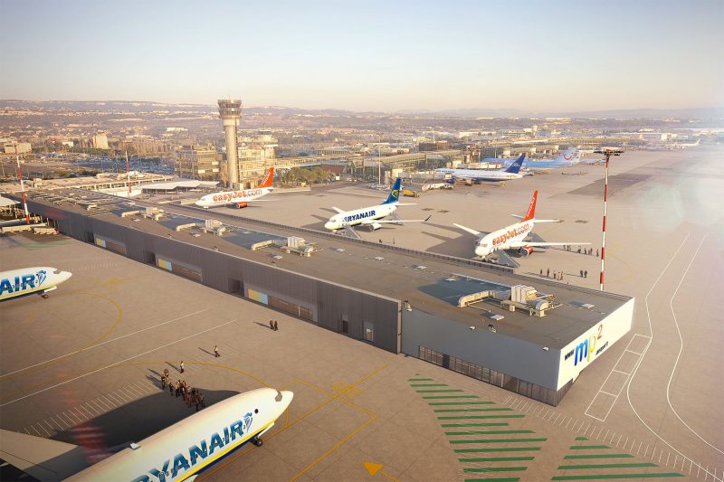 Perspective aérienne de l’aéroport Marseille-Provence avec l'extension mp2 au premier plan