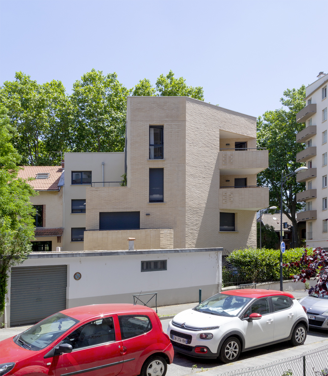 Photographie verticale de la façade arrière du logement Crampel